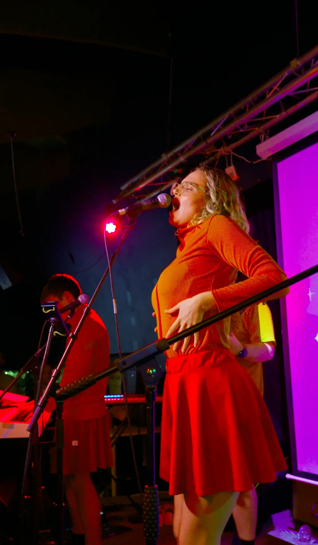 A band performing at a small venue in Camden Town, filmed by We Stream